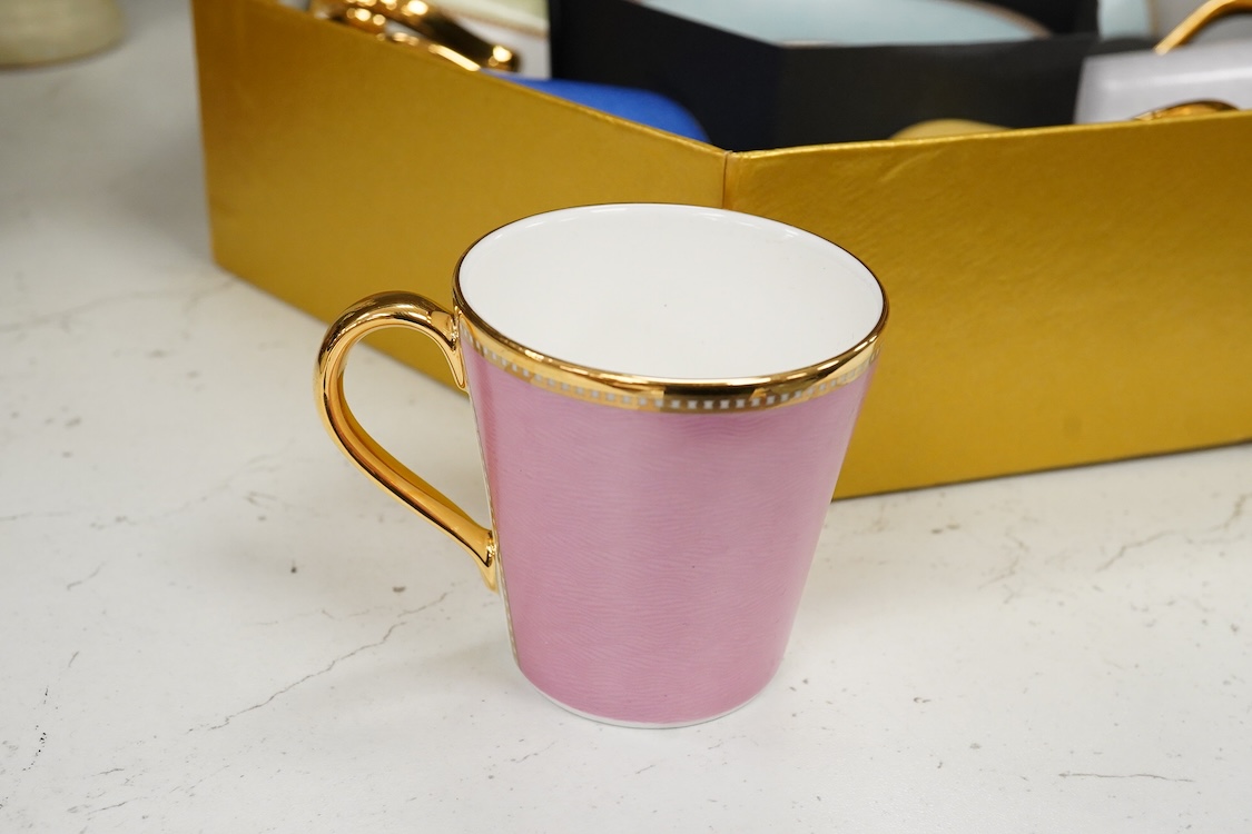 A Royal Collection of Faberge set of six bone china cups and saucers, boxed